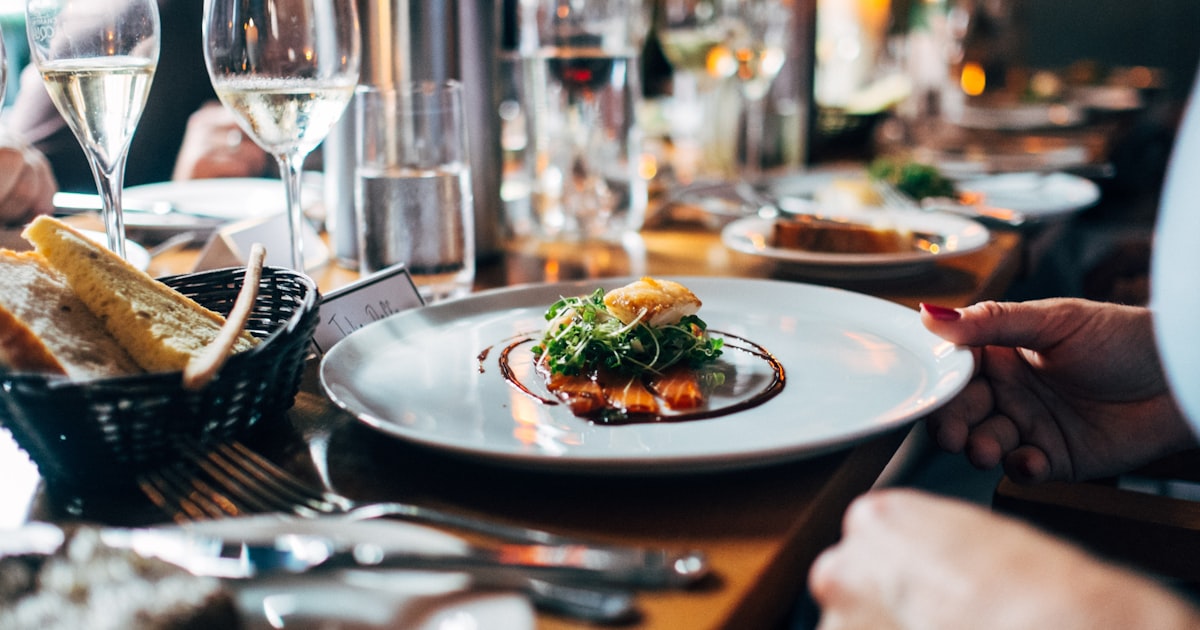 Business owner inside their restaurant or retail shop, confident and composed